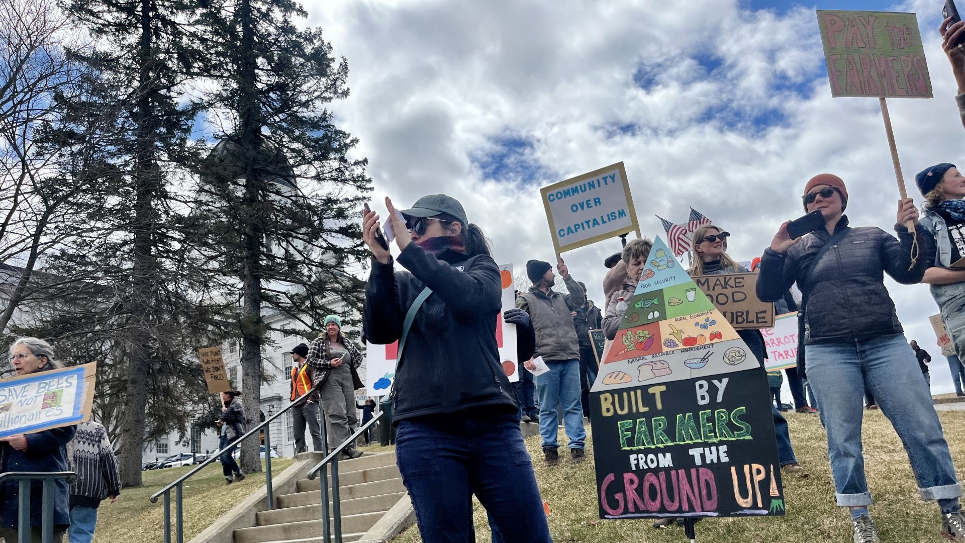 A crowd of demonstrators at a rally to restore cut USDA funding.