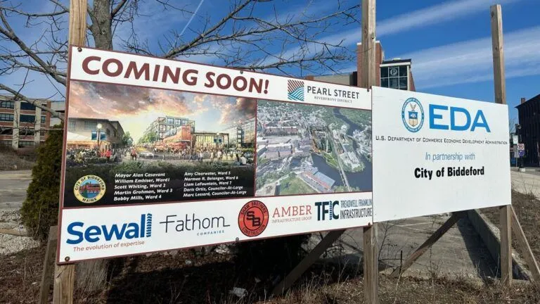 a coming soon touting the future development of housing.