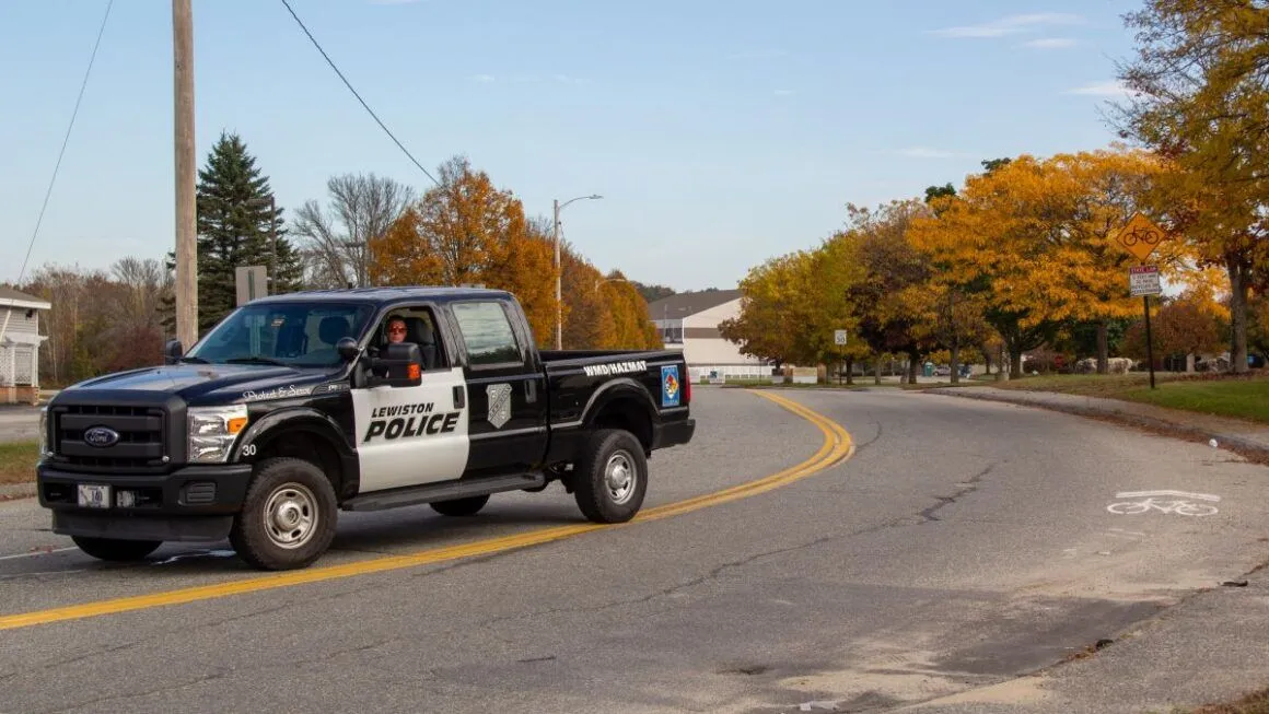 a police truck blocking a roadway