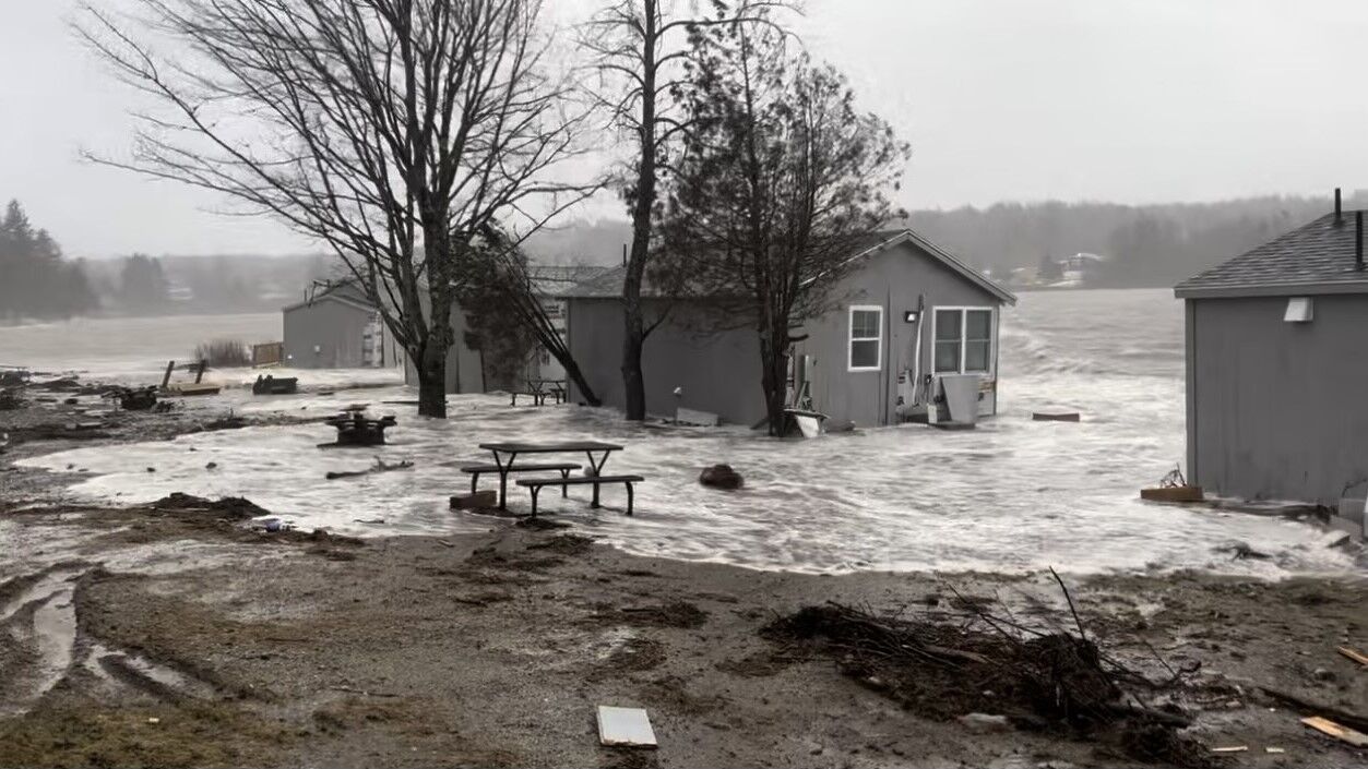 Water surrounds coastal cottages