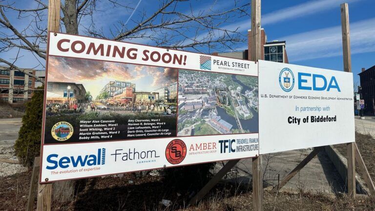 a coming soon touting the future development of housing.