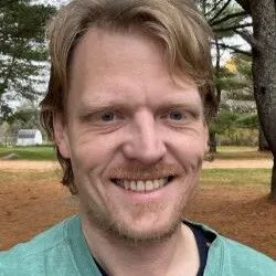 headshot of reporter Evan W. Houk