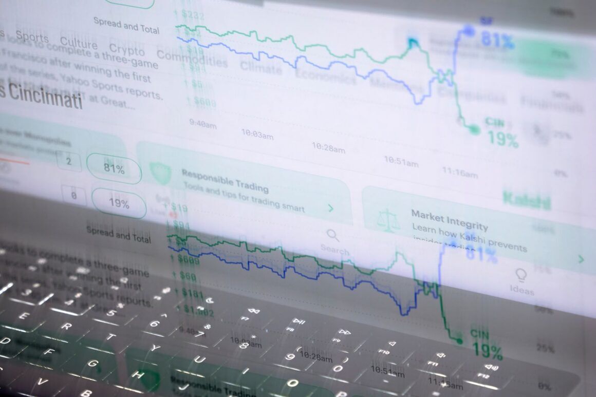 aptop displays trades made on Kalshi
