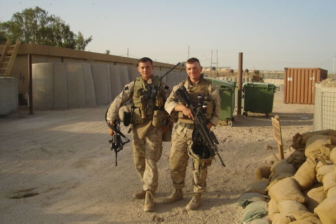 Jeff Hsu and Graham Platner pose for a photo while serving in Iraq.