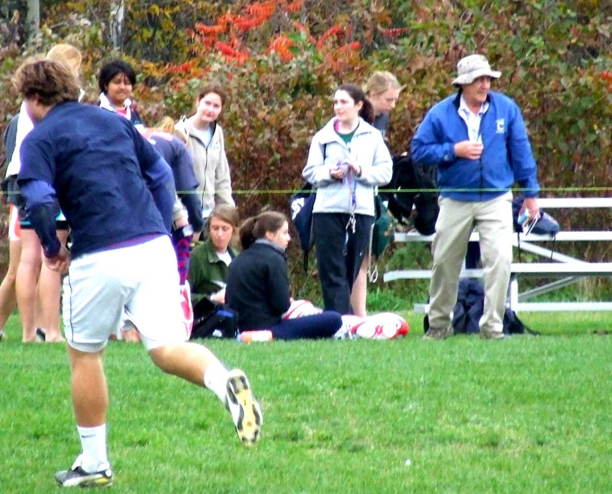 Tony Fletcher seen coaching a rugby team