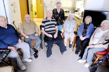 Residents of the Clover Health Care assisted living facility in Auburn are concerned about proposed cuts to assisted living centers. From left are: Robert Meservier, Francis Peters, Robert Weston, Mary Charpentier, Olive Donahue, Mary Ainaire and Rita Tardif.