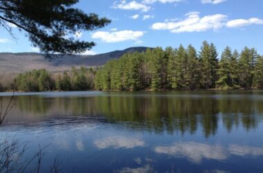 View of Bald Mountain and a body of water from Highland Plantation.