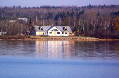the Pelletier home as seen from across a lake