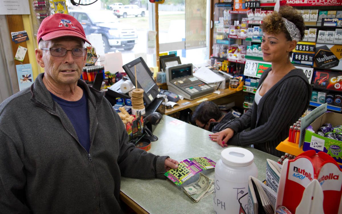 John Beaudoin, of Chelsea, purchases lottery tickets