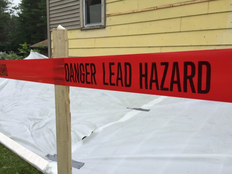 sign denoting the work area is contaminated with lead paint