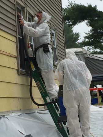 Contractor crew removes lead from a Maine home