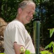 Michael Douglas examines plants