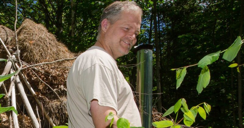 Michael Douglas examines plants