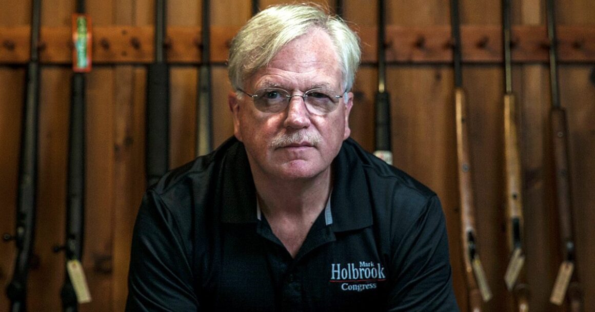 Mark Holbrook poses for a photo