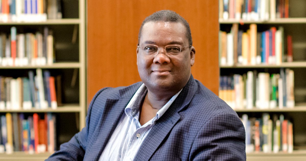 myron beasley poses for a photo