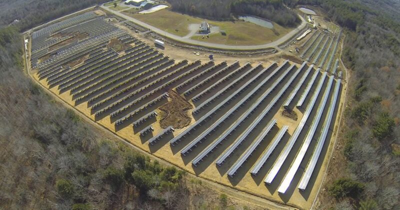 aerial view of solar panels in a field