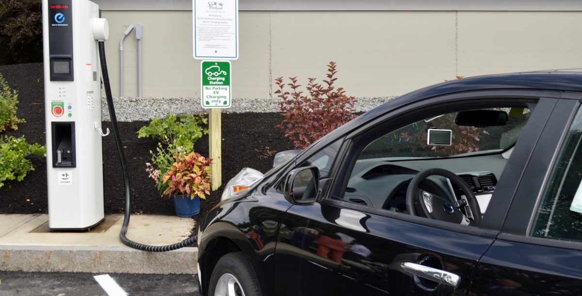 an electric car plugged in and charging