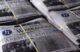 Stacks of bundled up editions of the Biddeford Journal Tribune.