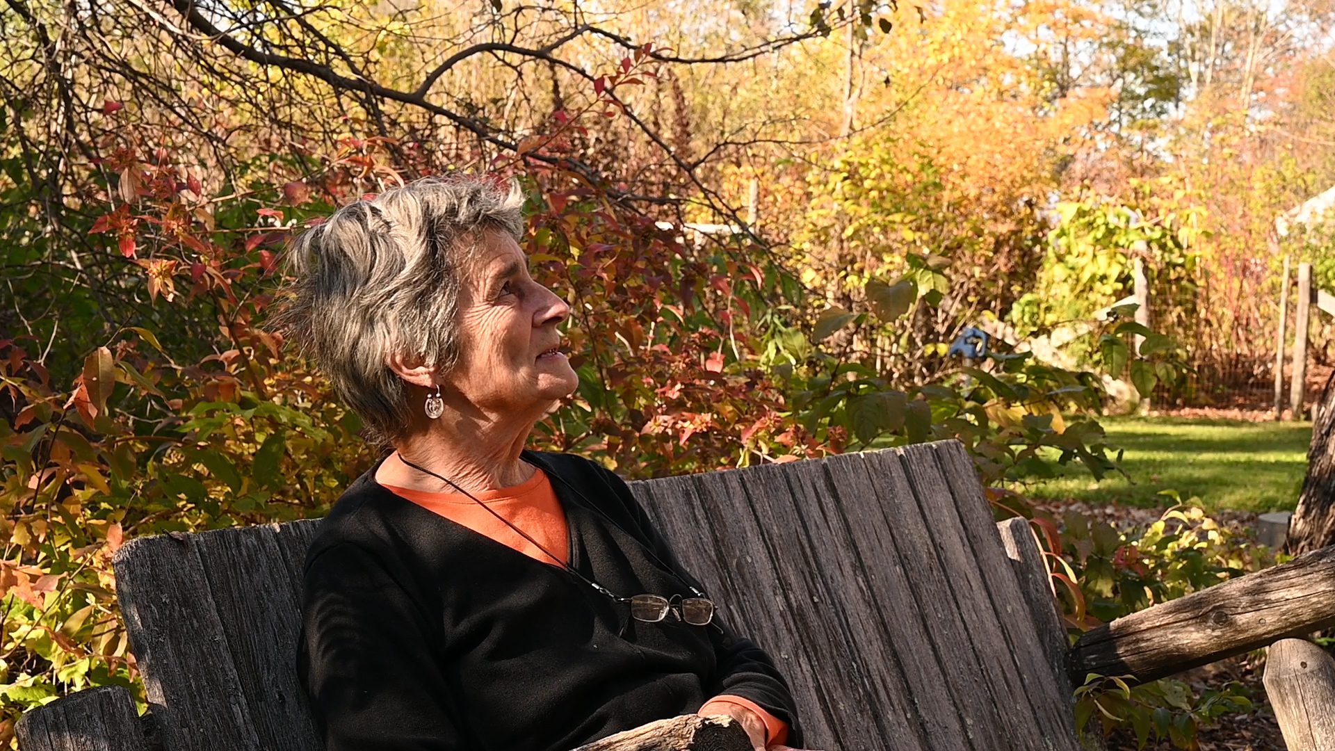 Sharon Turner sits on a bench