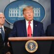 Trump stands at podium at White House Press Briefing