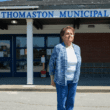 Joanne Richards poses for a photo outside the Thomaston municipal building