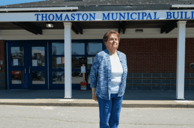 Joanne Richards poses for a photo outside the Thomaston municipal building