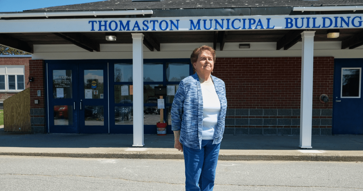Joanne Richards poses for a photo outside the Thomaston municipal building
