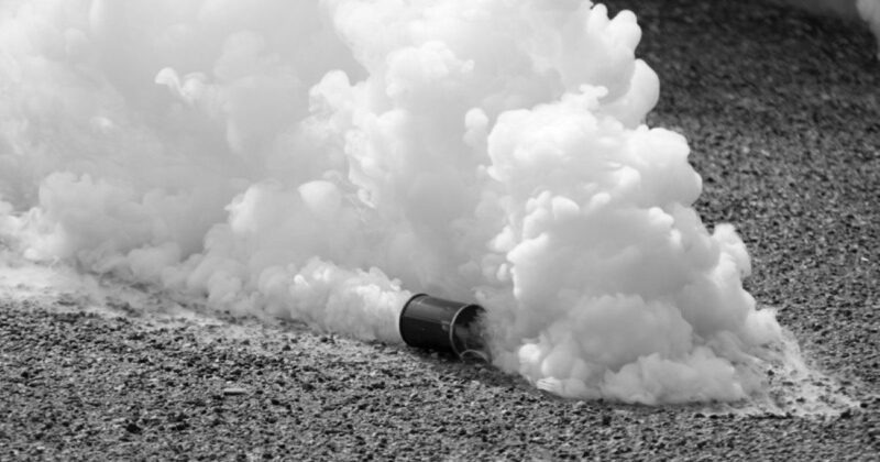 a deployed canister of tear gas