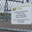 sign on a fence states the facility is a substation for Central Maine Power