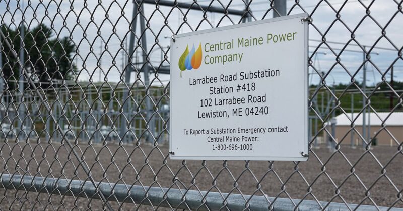 sign on a fence states the facility is a substation for Central Maine Power