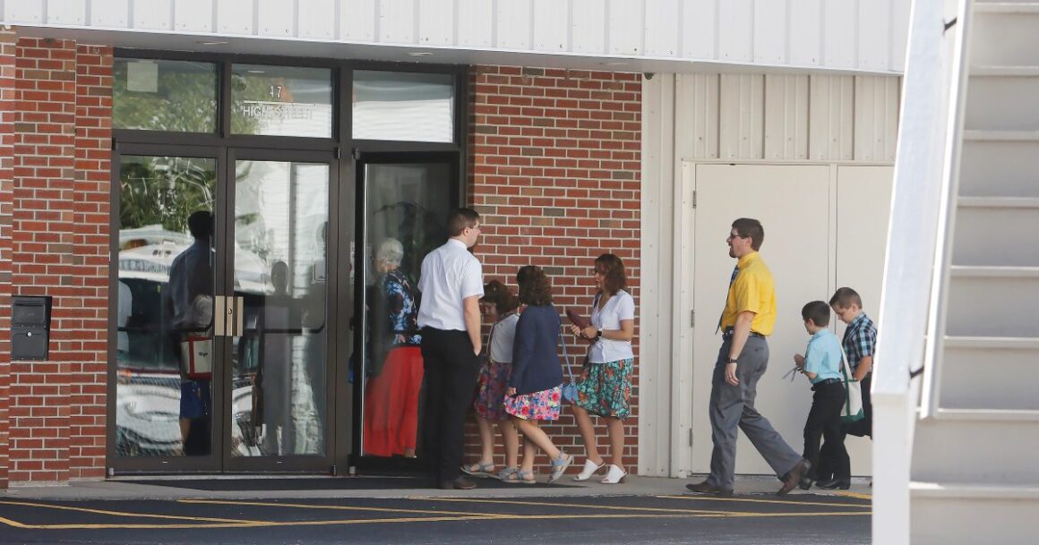 people walk into the Calvary Baptist Church