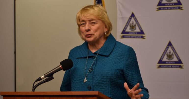 janet mills speaks during a press conference