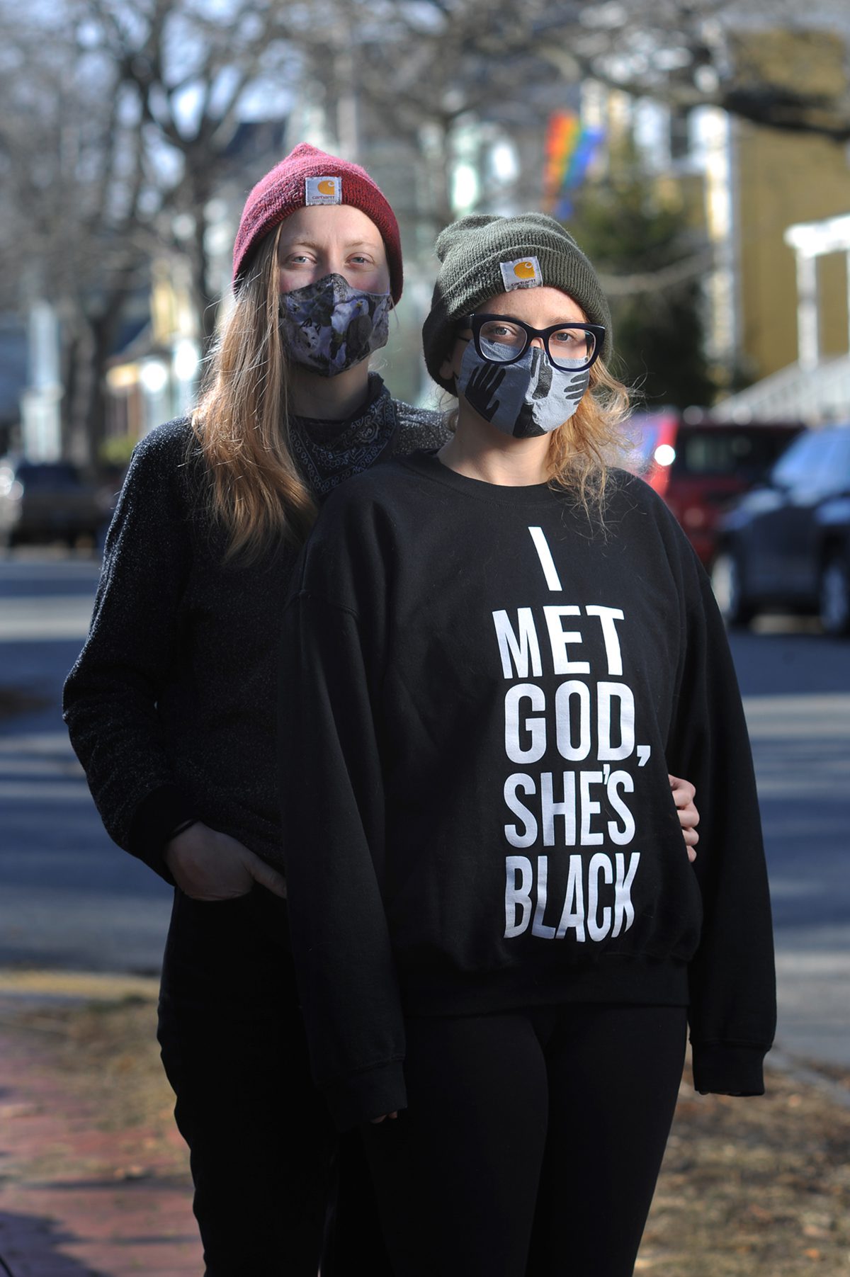 2 women of LGBTQ community standing on Portland Maine street