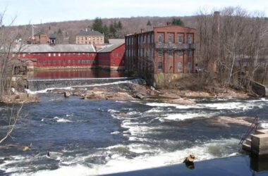 Commercial buildings near a body of water.