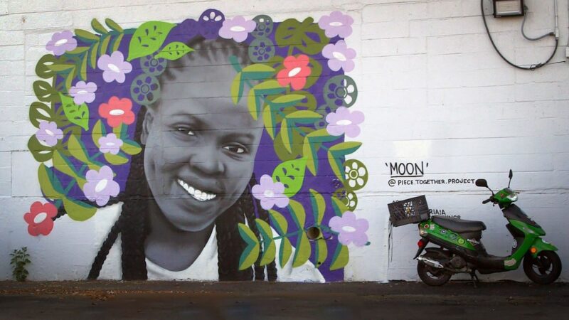 Nyamuon “Moon” Nguany Machar mural on a wall