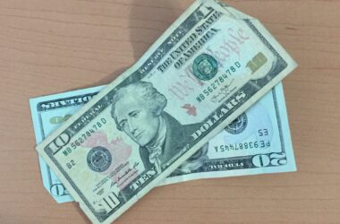 a $20 bill and a $10 bill