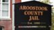 Sign outside Aroostook County Jail that reads Aroostook County Jail, Established 1889