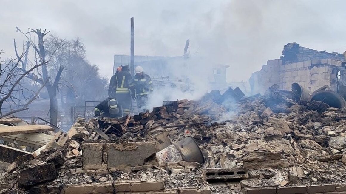 First responders attempt to search the rubble of a building that was attacked during Russia's invasion of Ukraine