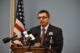Dr. Nirav Shah stands at a podium during a press conference.