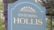 Sign along a roadway as you enter the Town of Hollis that reads ENTERING HOLLIS