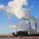 The coal-fired Cholla Power Plant with smoke arising from the plant