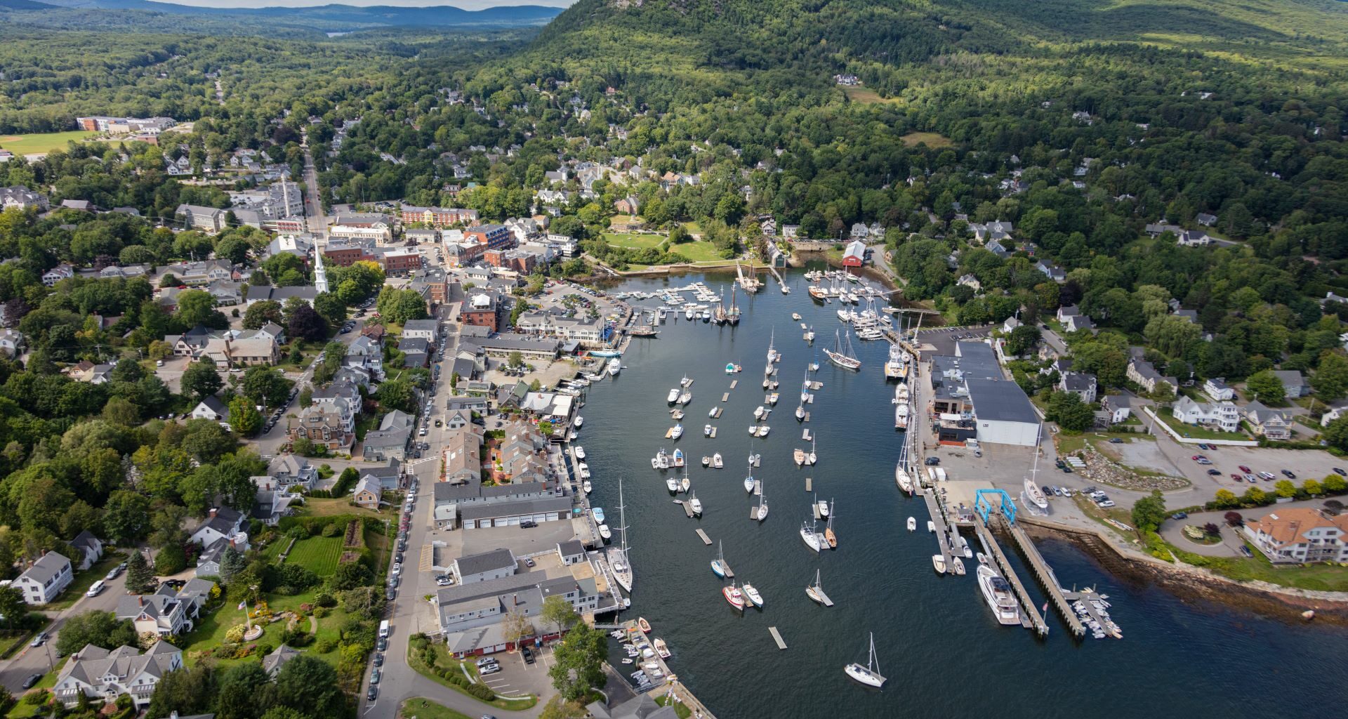 Aerial view of Camden Harbor showing how close buildings are to the water