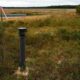 monitoring wells in an open field