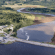 An aerial look at a causeway in Machias that runs over a river.