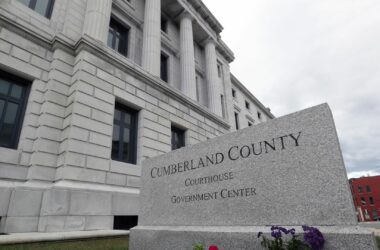 Exterior of the Cumberland County Courthouse, including a granite stone that reads Cumberland County Courthouse Government Center