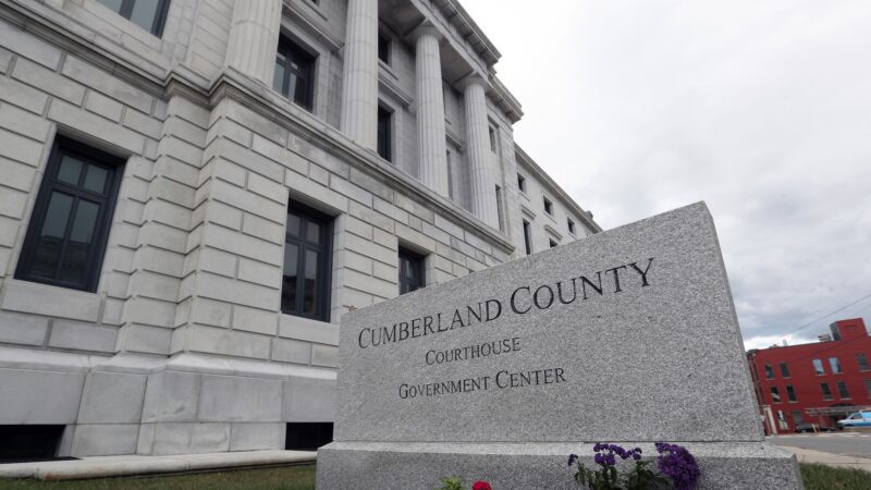Exterior of the Cumberland County Courthouse, including a granite stone that reads Cumberland County Courthouse Government Center