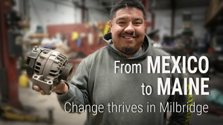 Photo of a man holding a car part with layover text reading "From Mexico to Maine: Change thrives in Milbridge"