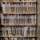 Shelves lined with numerous court case files.
