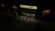 The exterior of a Dollar General store at night.