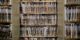 Numerous shelves packed with folders of court case files.